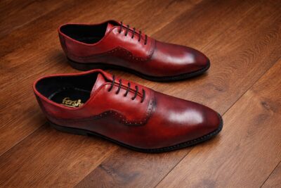 Red hand painted shoes